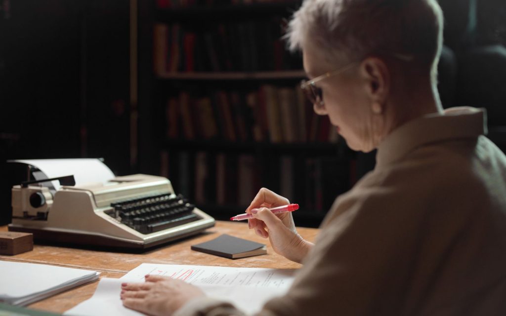 Editor reading and marking a text