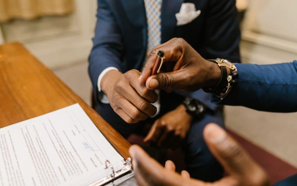 Pen handed over to sign a contract