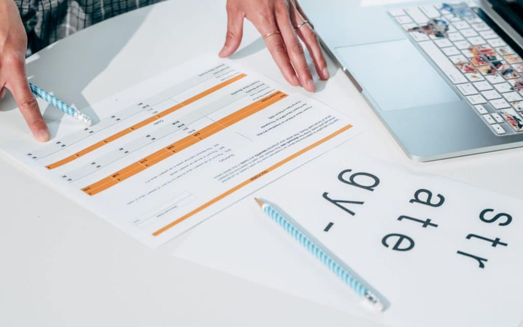 Person holding a printed document